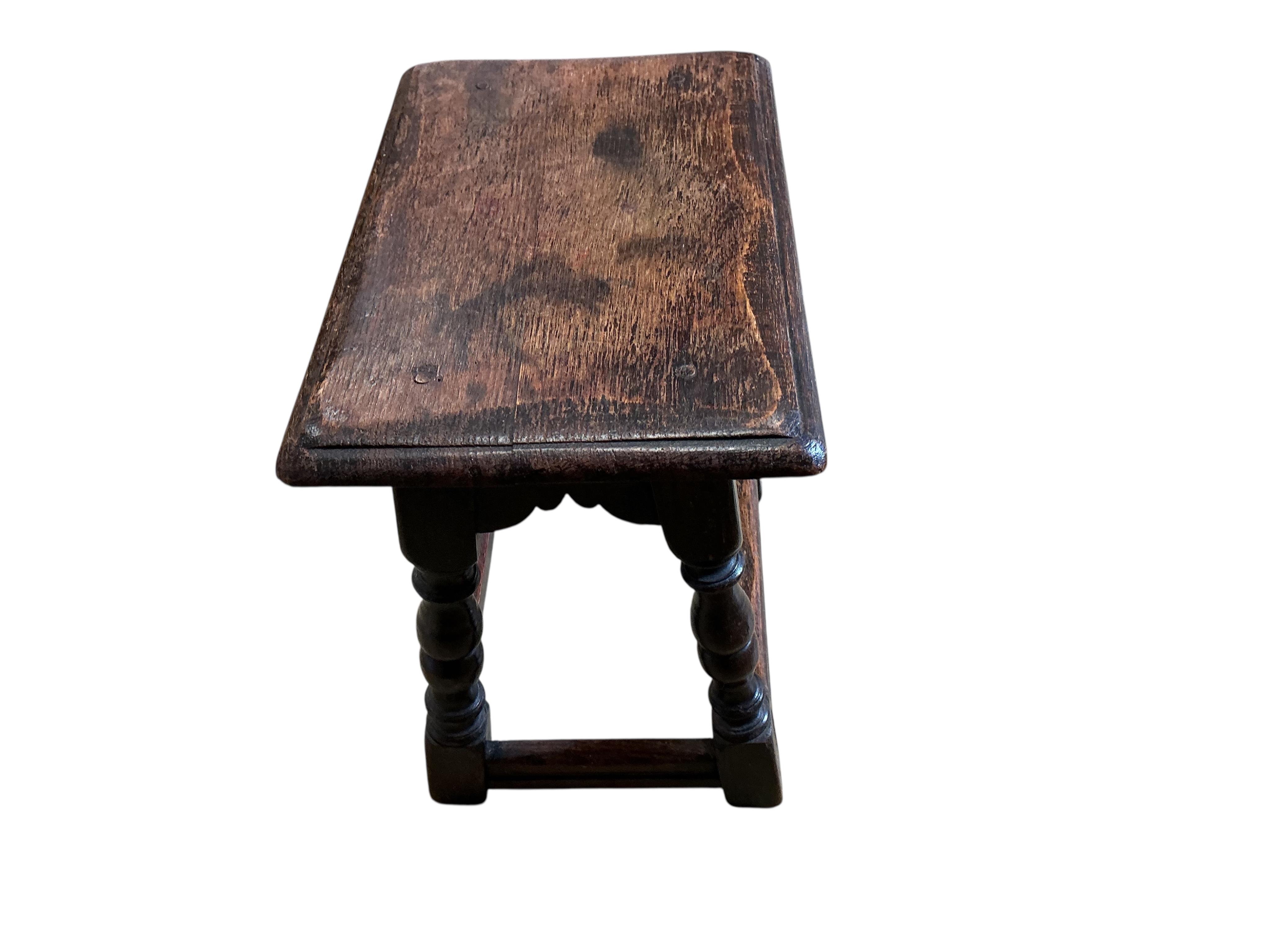 An 18th century style oak joint stool, width 45cm, depth 29cm, height 46cm